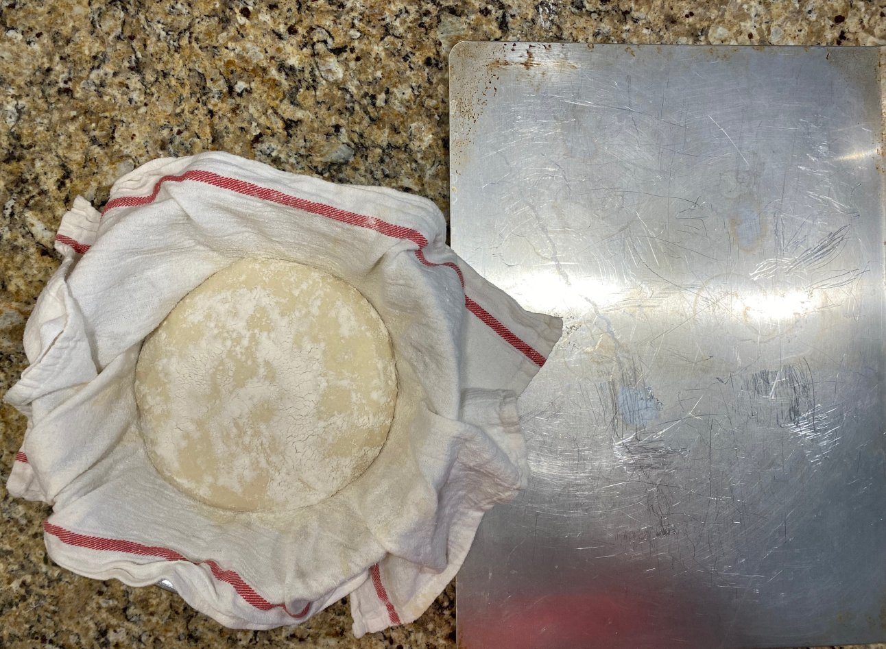 Sheet pan and dough in bowl unwrapped