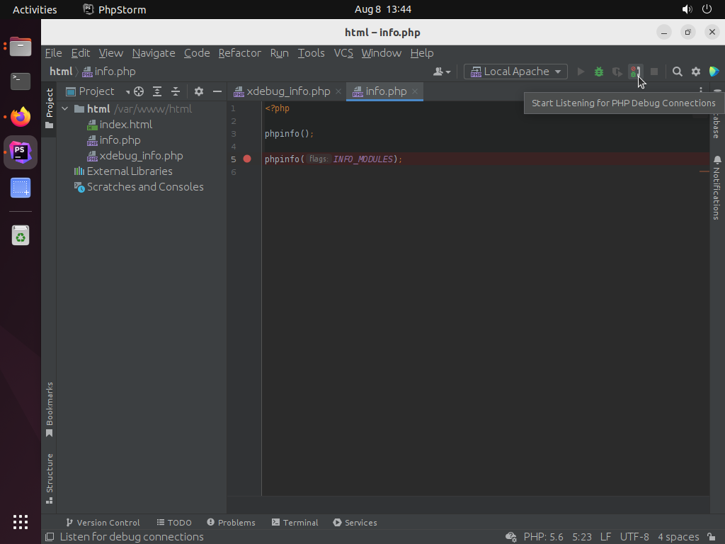 Screenshot of PHPStorm with the cursor next to the starting listening for debugging option on the Run Toolbar ready for selection.